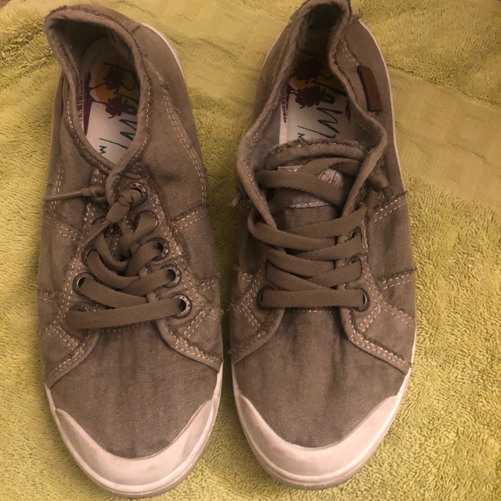 Slip on sneakers .  Color is tan/ or army green